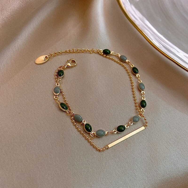 Bracelet à Double Pendentif