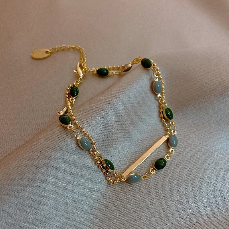 Bracelet à Double Pendentif