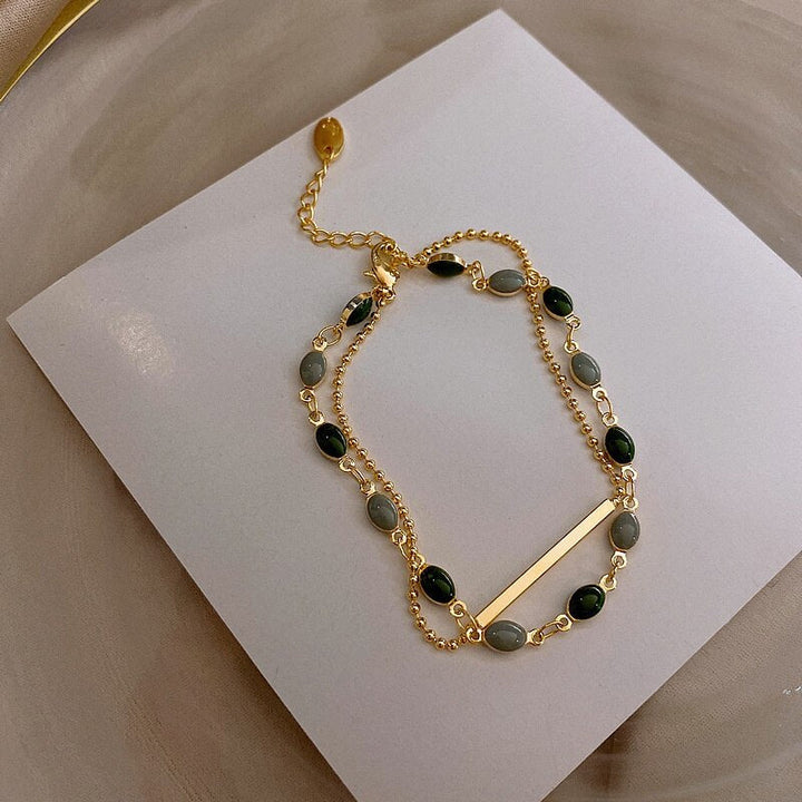 Bracelet à Double Pendentif