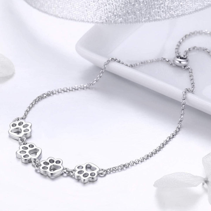 Bracelet en argent avec motif de patte – Taille ajustable