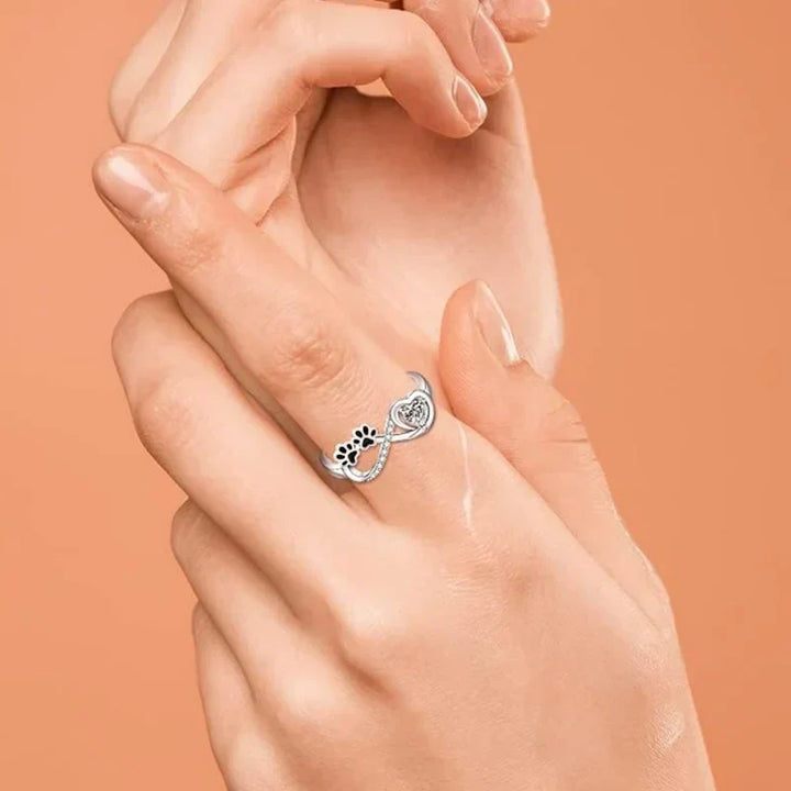 Bague en zirconium en forme de patte avec design cœur et symbole infini