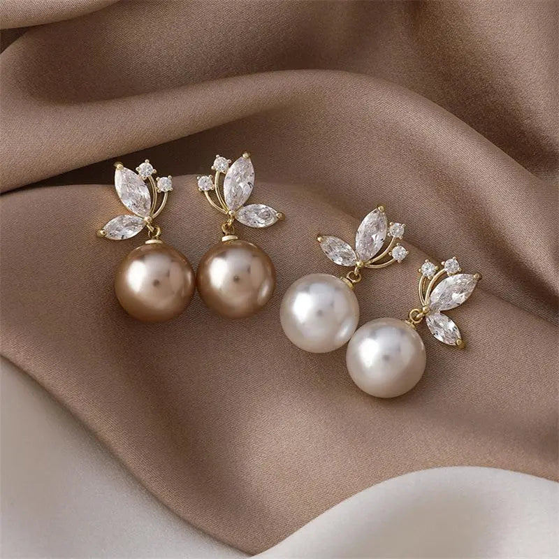 Boucles d’oreilles exotiques aux perles dorées et cristaux