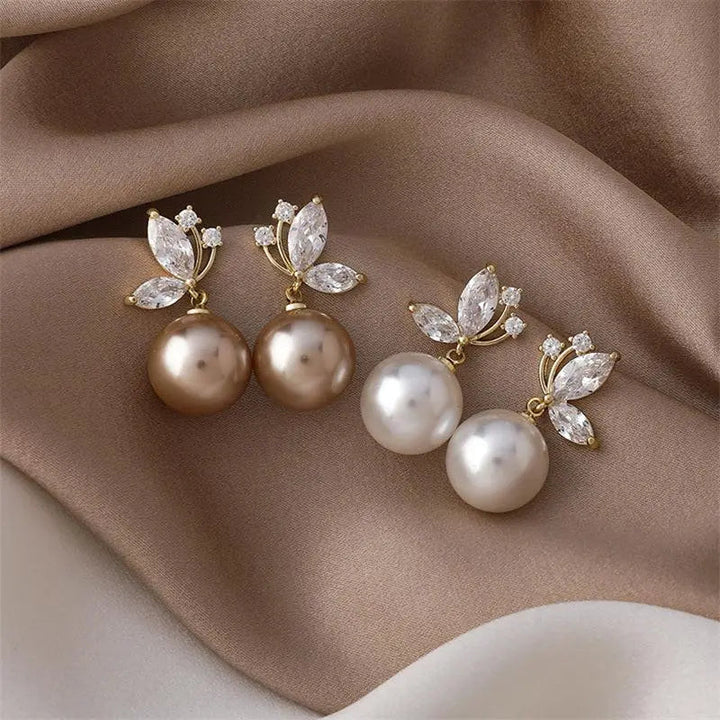 Boucles d’oreilles exotiques aux perles dorées et cristaux