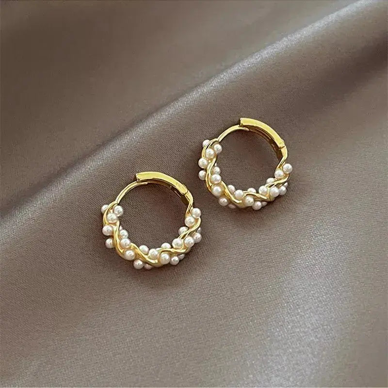 Élégantes boucles d'oreilles en perles sphériques