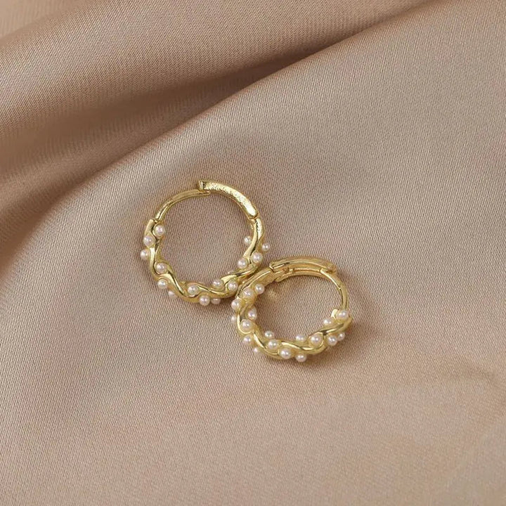 Élégantes boucles d'oreilles en perles sphériques
