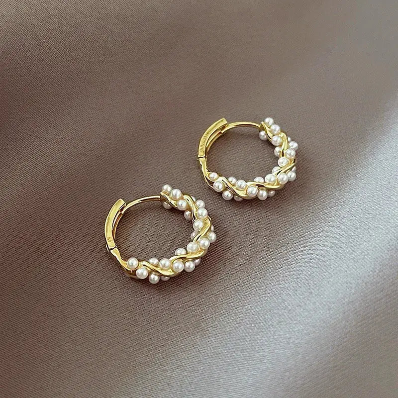 Élégantes boucles d'oreilles en perles sphériques
