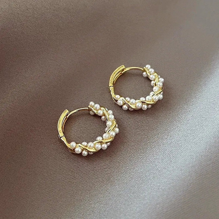 Élégantes boucles d'oreilles en perles sphériques