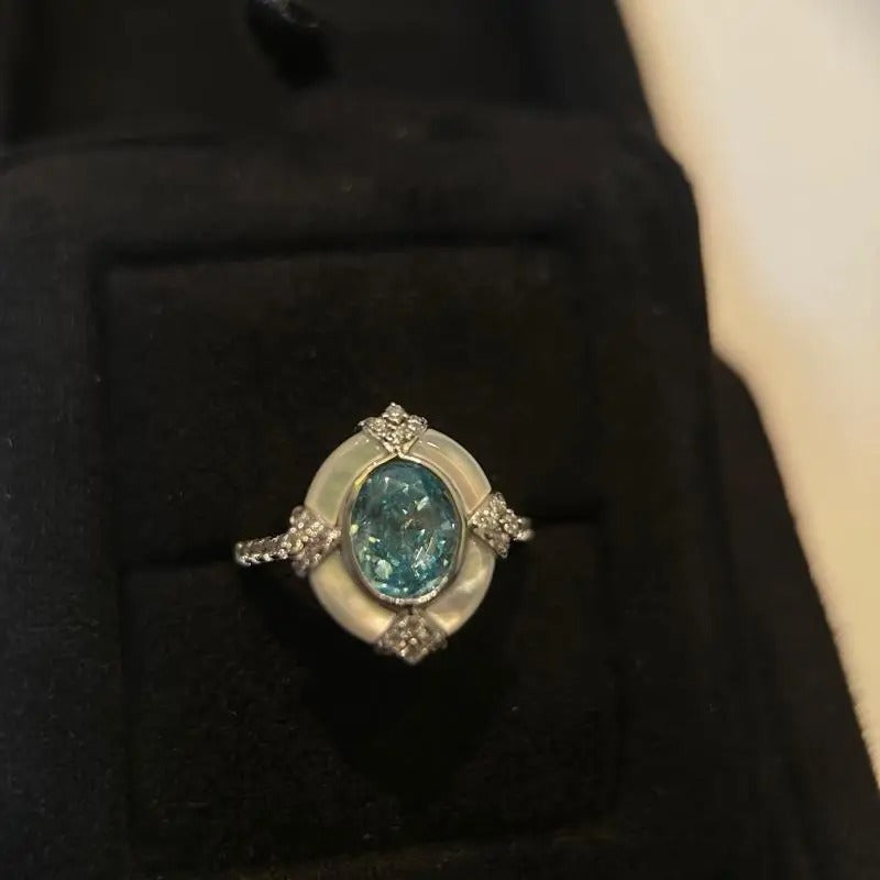 Anneau ajustable en argent blanc et aquamarine au style vintage intemporel