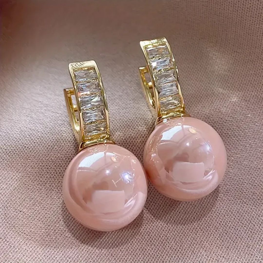 Boucles d'oreilles en or avec perle rose et zircon